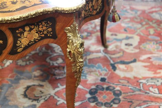 A French ormolu mounted marquetry and kingwood centre table, W.4ft 2in. D.2ft 6in. H.2ft 6in.